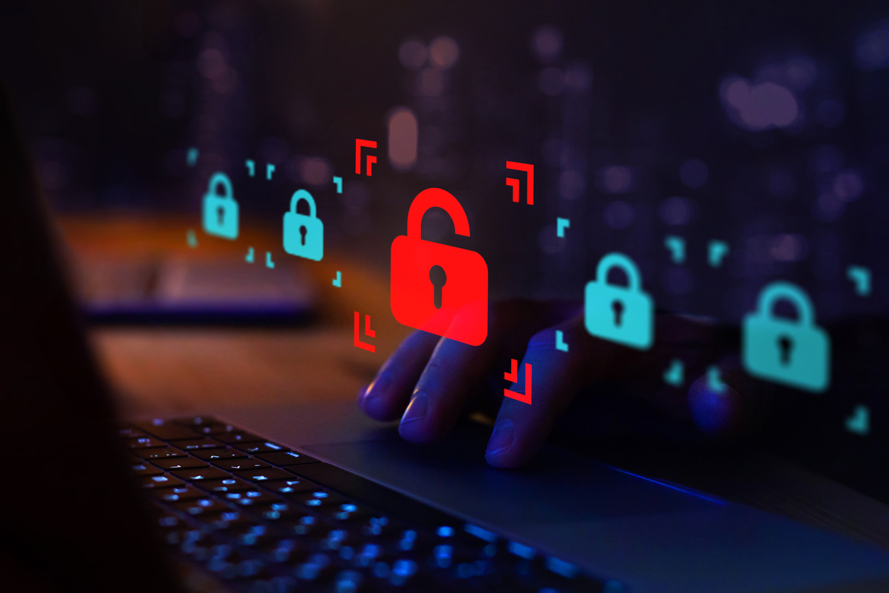 Digital locks hovering over hands on a keyboard