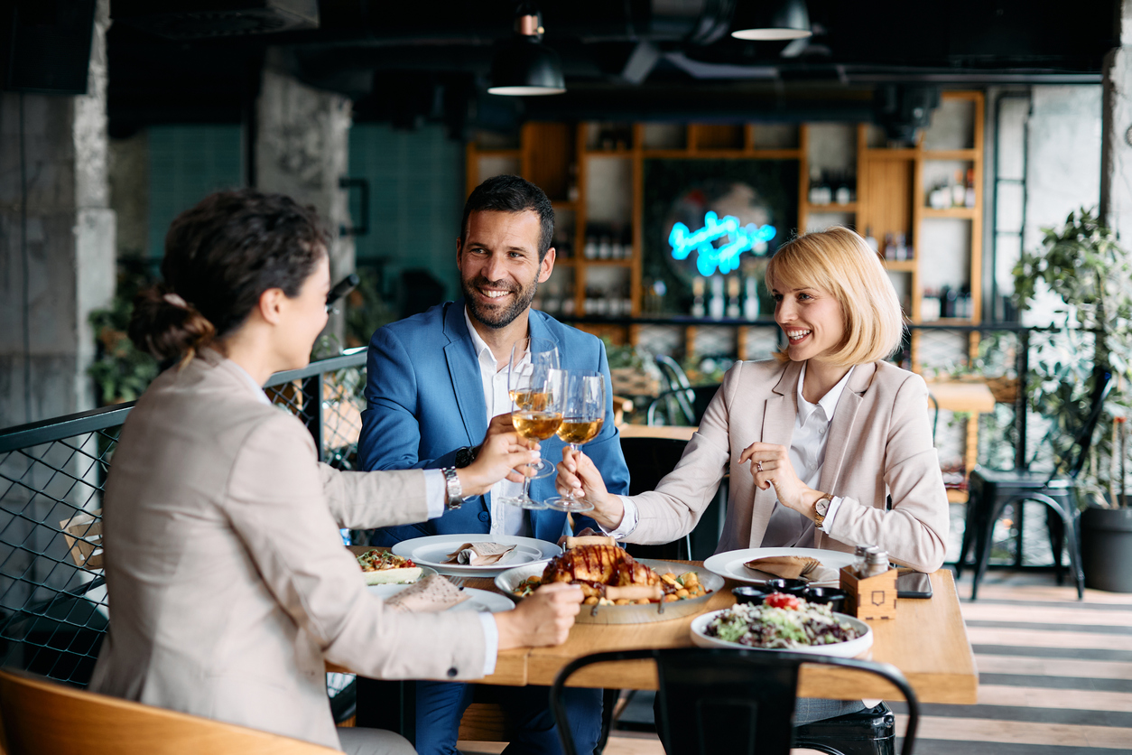 People drinking wine together in a bar